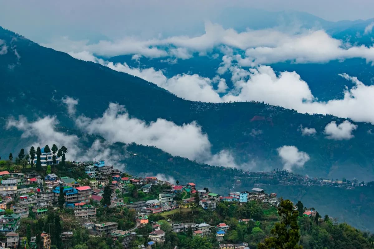 Darjeeling hillside town wrapped in cloud