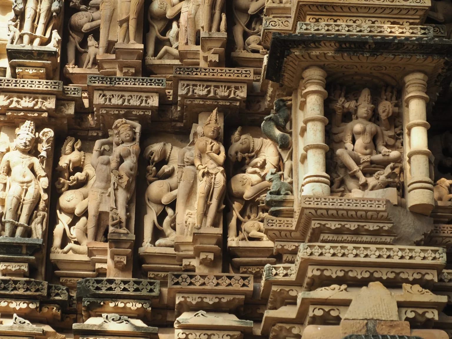 Detail of carved stone sculpture, Khajuraho