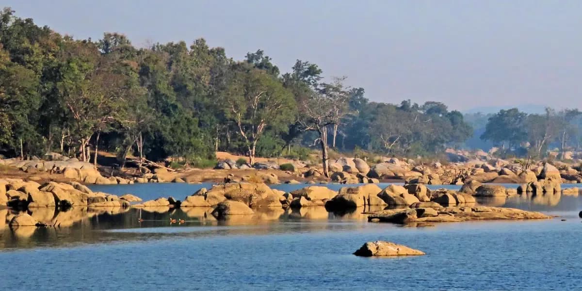 The Pench River winding through the national park